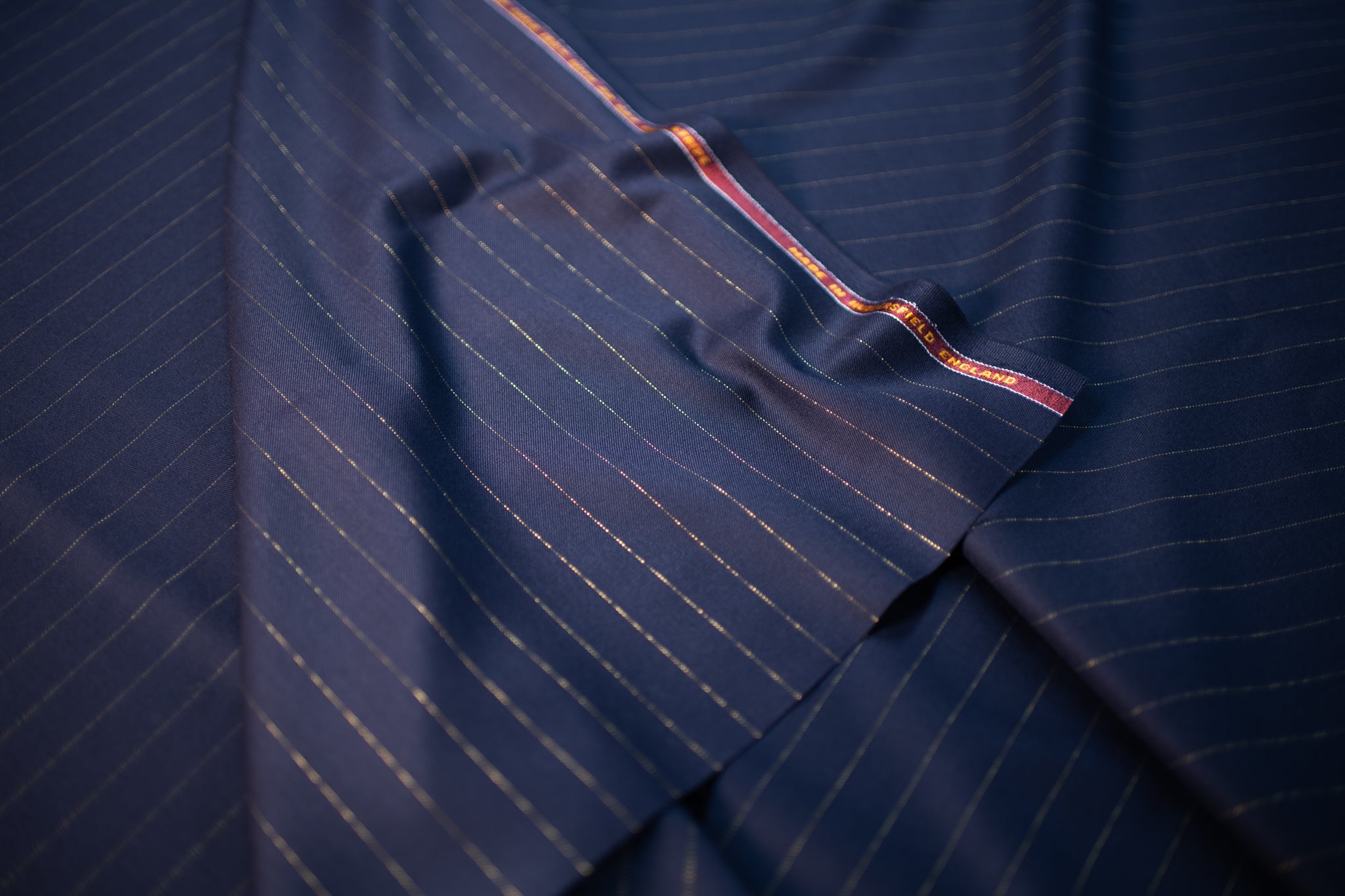 English-milled Huddersfield cloth with selvedge detail — fully canvassed tailoring